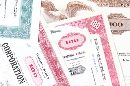 Shares - stock market share certificates from 1950s. Investment and finance business in America....