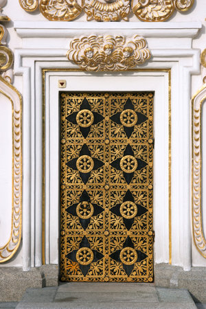 Door to Cathedral of the Dormition in Kiev Pechersk Lavra - famous monastery inscribed on UNESCO world heritage list. Ukrainian landmark.のeditorial素材