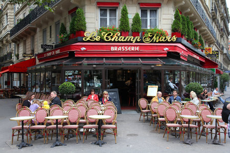 PARIS - JULY 21: Le Champ de Mars cafe on July 21, 2011 in Paris, France. Le Champ de Mars cafe is a typical establishment for Paris, one of largest metropolitan areas in Europe.のeditorial素材