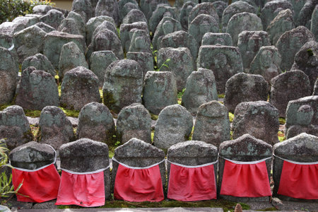 Kyoto, Japan - small jizo statues at famous Daitokuji (Daitoku-ji) Temple. Buddhist zen temple of Rinzai school. Jizo, also known as Ksitigarbha are bodhisattvas in East Asian Buddhism.のeditorial素材
