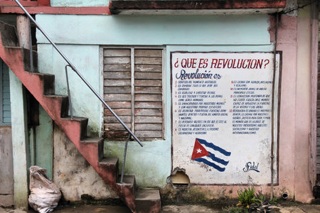 BARACOA, CUBA - FEBRUARY 14: Wall mural celebrates Revolution and Socialism on February 14, 2011 in Baracoa, Cuba. Cuban Revolution brought famous Fidel Castro to power in 1953.のeditorial素材