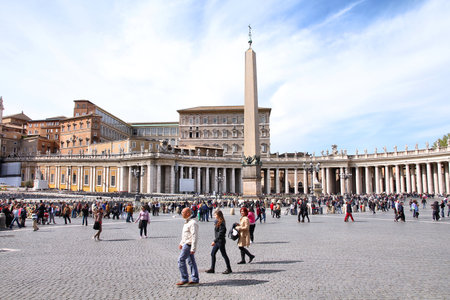 VATICAN CITY, VATICAN - APRIL 9: Pilgrims visit Saint Peter's Square on April 9, 2012 in Vatican City, Vatican. Saint Peter's Square is among most popular pilgrimage sites for Roman Catholics.のeditorial素材