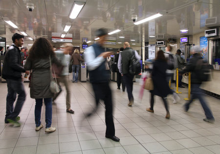LONDON - MAY 14: Commuters hurry at Notting Hill Gate underground station on May 14, 2012 in London. London Underground is the 11th busiest metro system worldwide with 1.1 billion annual rides.のeditorial素材
