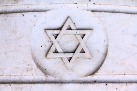 Star of David - Jewish symbol on an old Hebrew grave in Campo Verano cemetery, Rome.
