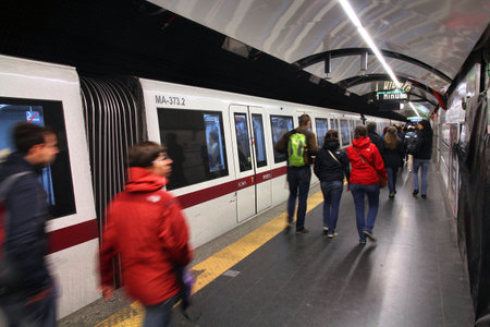 ROME - APRIL 8: Commuters walk in metro station on April 8, 2012 in Rome. Rome Metro has annual ridership of 331 million on its 2 lines. 3rd line is under construction (2012).のeditorial素材
