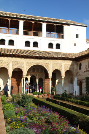 GRANADA, SPAIN - OCTOBER 15: Tourists visit Alhambra on October 15, 2010 in Granada, Spain. Alhambra is more than 1000 years old and is a UNESCO World Heritage Site.のeditorial素材