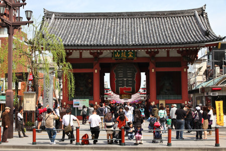 TOKYO - APRIL 13: People visit Nakamise shopping street Asakusa on April 13, 2012 in Tokyo. Tokyo is the most visited city in Japan. Japan had 8.3 million foreign visitors in 2008.のeditorial素材