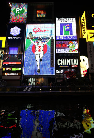 OSAKA, JAPAN - APRIL 24: Glico Man neon on April 24, 2012 in Osaka, Japan. Existing since 1935, Glico Man is one of most recognized neons worldwide.のeditorial素材