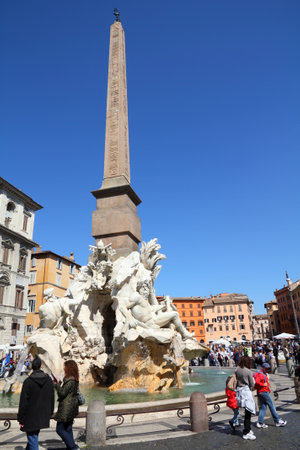 ROME - APRIL 10: Tourists visit Piazza Navona on April 10, 2012 in Rome. According to Euromonitor, Rome is the 3rd most visited city in Europe (5.5m international tourist arrivals 2009)のeditorial素材