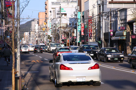 KYOTO, JAPAN - APRIL 14: Cars drive in heavy traffic on April 14, 2012 in Kyoto, Japan. With 589 vehicles per capita, Japan is among most motorized countries worldwide, which causes heavy traffic.のeditorial素材