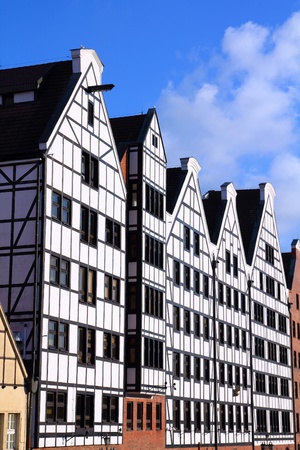 Poland - Gdansk city (also know nas Danzig) in Pomerania region. Famous old granaries next to...