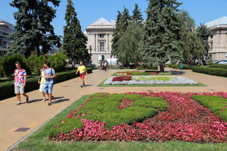 PLOIESTI, ROMANIA - AUGUST 20: People visit city park on August 20, 2012 in Ploiesti, Romania. Ploiesti is the 9th largest city in Romania and exists since 1596. It is famous for oil industry.のeditorial素材
