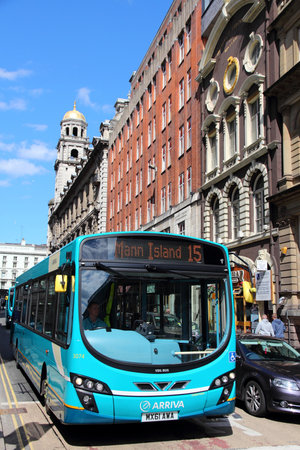 LIVERPOOL, UK - APRIL 20: People ride Arriva bus on April 20, 2013 in Liverpool, UK. Arriva Group employs 47,500 people and serves over 1.5 billion passenger rides each year.のeditorial素材