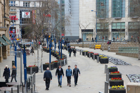 MANCHESTER, UK - APRIL 22: People visit shopping area on April 22, 2013 in Manchester, UK. Greater Manchester is the 3rd most populous urban area in the UK (2.2 million people).のeditorial素材