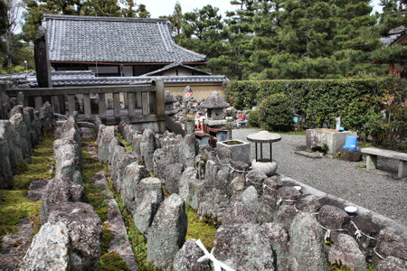 Kyoto, Japan - small jizo statues at famous Daitokuji (Daitoku-ji) Temple. Buddhist zen temple of Rinzai school. Jizo, also known as Ksitigarbha are bodhisattvas in East Asian Buddhism.のeditorial素材