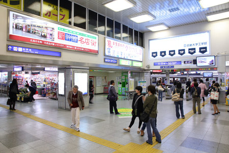 HIROSHIMA, JAPAN - APRIL 22: People hurry at Hiroshima Station on April 22, 2012 in Hiroshima, Japan. The station exists since 1894 and had daily ridership of 70,000 in 2011.のeditorial素材