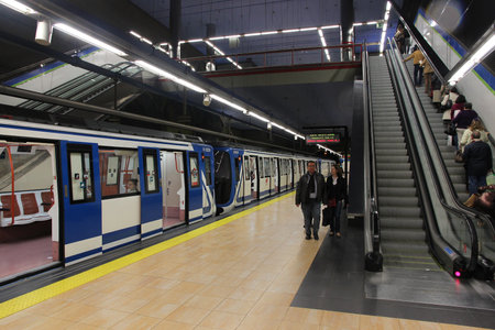 MADRID - OCTOBER 24: People exit Madrid Metro on October 24, 2012 in Madrid. Madrid Metro has annual ridership of 634 million passengers (2011).のeditorial素材