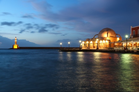 Chania, town on Crete island in Greece. Old town and Venetian harbor evening view.の写真素材