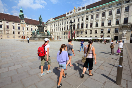 VIENNA - SEPTEMBER 5: People visit Hofburg palace courtyard on September 5, 2011 in Vienna. As of 2008, Vienna was the 20th most visited city worldwide (by international visitors).のeditorial素材