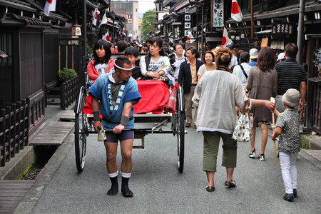TAKAYAMA, JAPAN - APRIL 29: People visit the Old Town on April 29, 2012 in Takayama, Japan. Takayama is among top 25 tourism destinations in Japan according to Japan-Guide.com.のeditorial素材