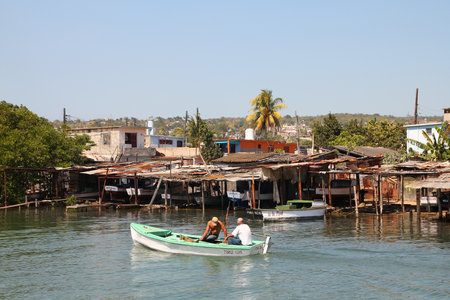 MATANZAS, CUBA - FEBRUARY 22: Men go fishing on February 22, 2011 in Matanzas, Cuba. With constant deficit of basic food products in Cuba, fishing is a popular activity.のeditorial素材