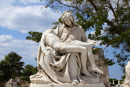 Cuba - the main cemetery of Havana. Necropolis Cristobal Colon. Pieta theme monument.の写真素材