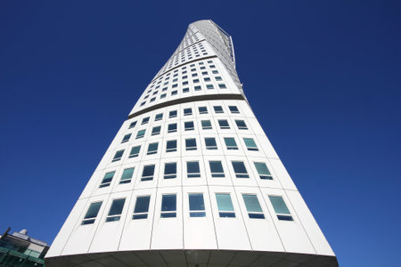 MALMO, SWEDEN - MARCH 8: Turning Torso skyscraper on March 8, 2011 in Malmo, Sweden. Designed by Santiago Calatrava, it is the most recognized landmark of Malmo today.のeditorial素材