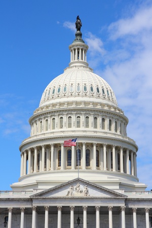 Washington DC, capital city of the United States. National Capitol building with US flag.の写真素材