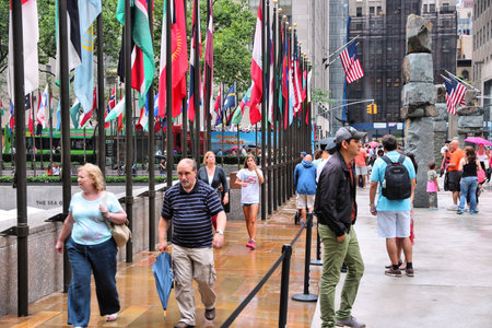NEW YORK - JULY 1: People visit Rockefeller Center on July 1, 2013 in New York. Rockefeller Center is one of most recognized landmarks in the United States and is a National Historic Landmark.のeditorial素材