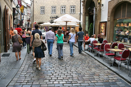 PRAGUE - AUGUST 3: People visit Old Town on August 3, 2008 in Prague, Czech Republic. Old Prague is a UNESCO World Heritage Site. Half of Czech tourism income is spent in Prague.のeditorial素材