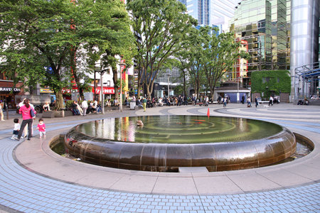 TOKYO - MAY 11: People shop in Ikebukuro district on May 11, 2012 in Tokyo. Ikebukuro is considered one of most important shopping areas in Tokyo, the largest city in the world.のeditorial素材