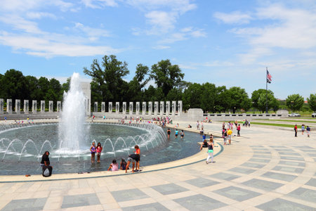WASHINGTON - JUNE 13: People visit National World War II Memorial on June 13, 2013 in Washington. 18.9 million tourists visited capital of the United States in 2012.のeditorial素材