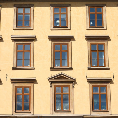 Stockholm, Sweden. Rows of windows in a generic apartment building. Square composition.のeditorial素材
