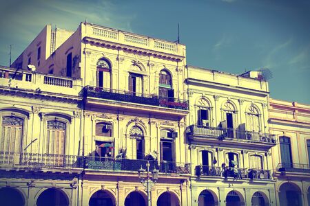 Havana, Cuba - city architecture. Old residential buildings. Cross processed color style - retro tone.の写真素材