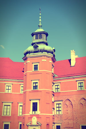 Warsaw, Poland. Old Town - famous Royal Castle. Cross processed color style - retro tone.のeditorial素材