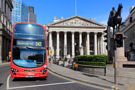 LONDON, UK - MAY 15, 2012: People ride London Bus in London. As of 2012, LB serves 19,000 bus stops with a fleet of 8000 buses. On a weekday 6 million rides are served.のeditorial素材