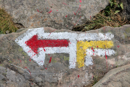 Babia Gora National Park (Babiogorski Park Narodowy) in Poland. Tourist trail signs on a rock.の写真素材