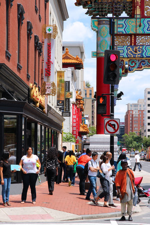 WASHINGTON, USA - JUNE 14, 2013: People visit Chinatown in Washington, DC, USA. Chinese minority of about 3,000 people lives here.のeditorial素材