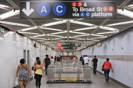 NEW YORK, USA - JULY 3, 2013: People visit a subway station in New York. With 1.67 billion annual rides, New York City Subway is the 7th busiest metro system in the world.のeditorial素材