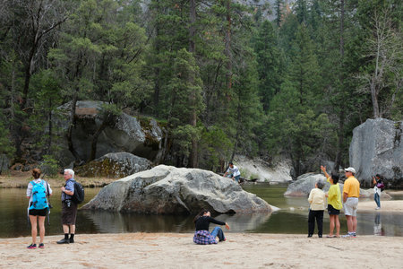 YOSEMITE, USA - APRIL 11, 2014: People visit Yosemite National Park, California. The park had 3,853,404 visitors in 2012.のeditorial素材