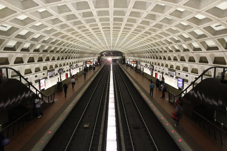 WASHINGTON, USA - JUNE 14, 2013: People board subway train in Washington. With 212 million annual rides in 2012 Washington Metro is the 3rd busiest rapid transit system in the USA.のeditorial素材