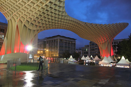 SEVILLE, SPAIN - NOVEMBER 3, 2012: People visit Metropol Parasol in Seville, Spain. Metropol Parasol claims to be the largest wooden structure in the world.のeditorial素材