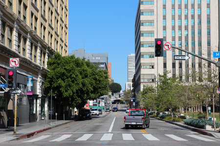 LOS ANGELES, USA - APRIL 5, 2014: People drive cars in downtown LA. Los Angeles is the 2nd most populous city in the USA (3,792,621 people).のeditorial素材