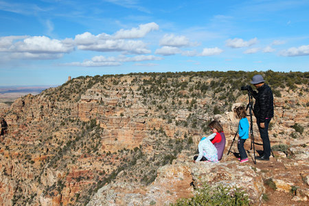 GRAND CANYON, USA - APRIL 3, 2014: People visit Grand Canyon National Park in Arizona. 4.56 million tourists visited Grand Canyon in 2013.のeditorial素材