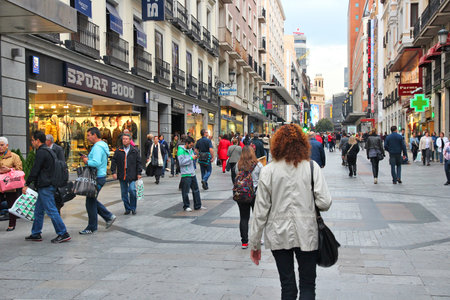 MADRID, SPAIN - OCTOBER 24, 2012: People shop downtown in Madrid. Madrid is a popular tourism destinations with 3.9 million estimated annual visitors (official data).のeditorial素材