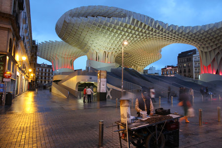 SEVILLE, SPAIN - NOVEMBER 3, 2012: People visit Metropol Parasol in Seville, Spain. Metropol Parasol claims to be the largest wooden structure in the world.のeditorial素材