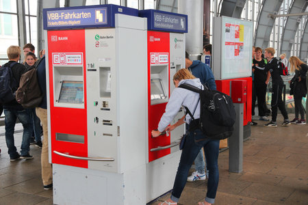 BERLIN, GERMANY - AUGUST 26, 2014: People wait at Alexanderplatz railway station in Berlin. The...