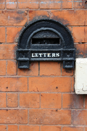 Birmingham. Old letterbox detail in Jewellery Quarter. West Midlands, England.の写真素材