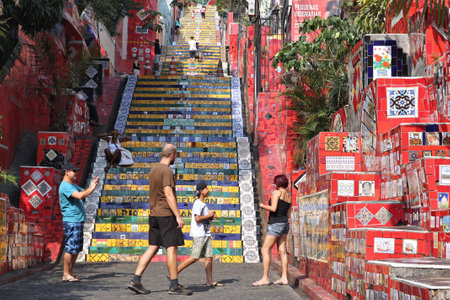 RIO DE JANEIRO, BRAZIL - OCTOBER 19, 2014: People visit Selaron Steps in Rio de Janeiro. The landmark was created by Chilean born artist Jorge Selaron in 1990-2013.のeditorial素材