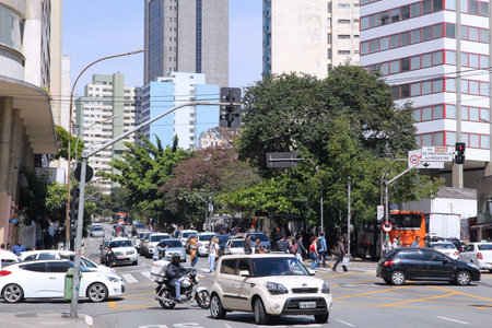 SAO PAULO, BRAZIL - OCTOBER 6, 2014: People drive in Sao Paulo. With 21.2 million people Sao Paulo metropolitan area is the 8th most populous in the world.のeditorial素材